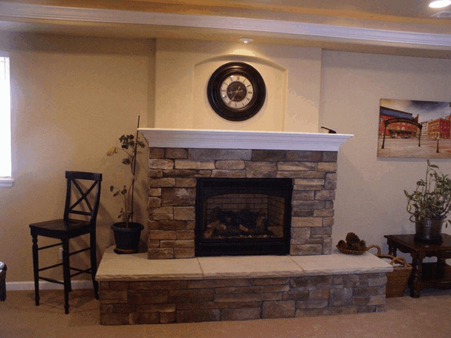 Stone fireplace with decorative clock